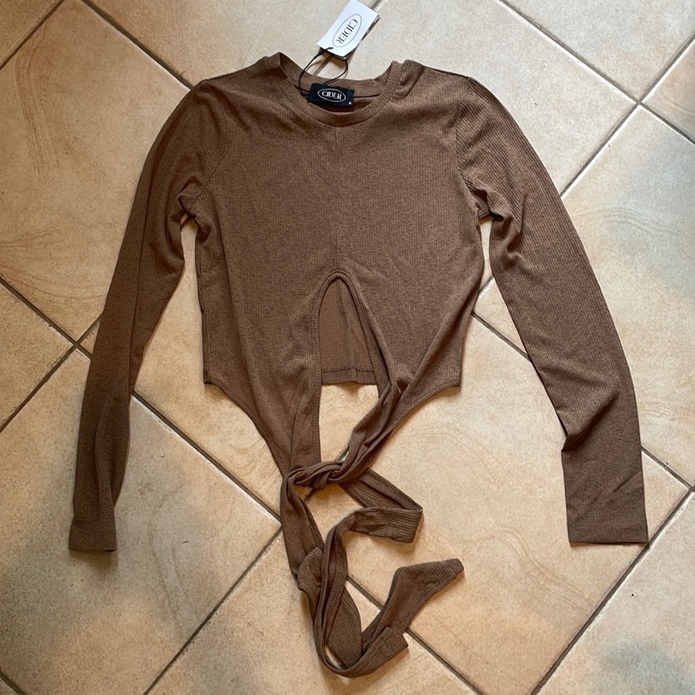 Small cider top that ties in the front, never been worn, super cute!!